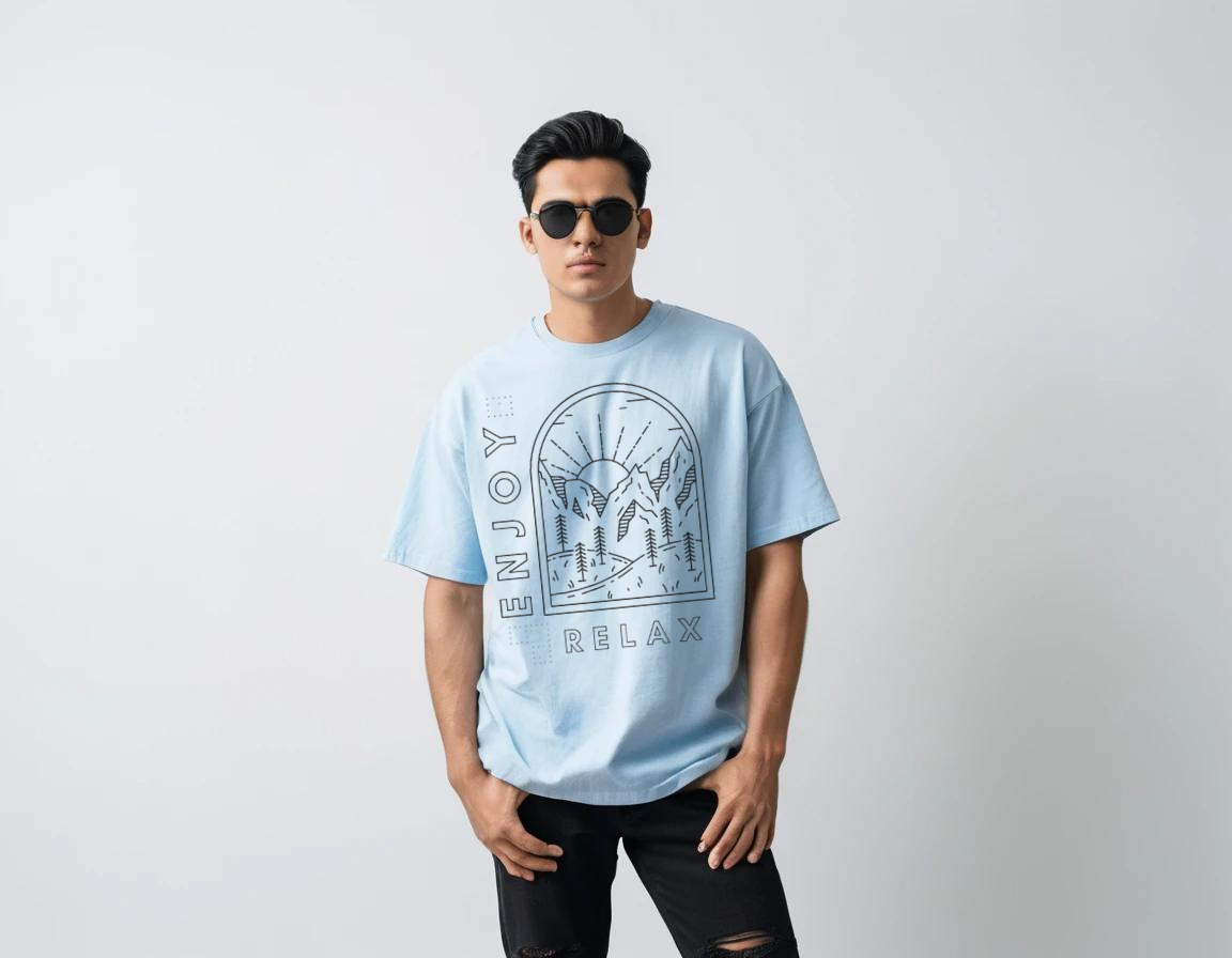 Men's baby blue half sleeve graphic printed over-sized t-shirt.