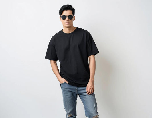 Men's solid black half sleeve oversized  t-shirt.