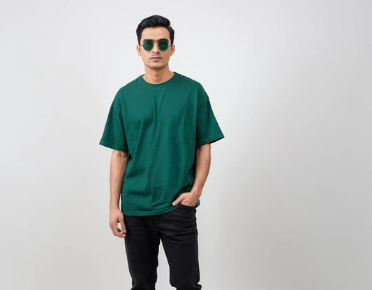 Men's solid bottle green half sleeve oversized  t-shirt.