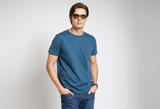 Men's solid petrol blue half sleeve round neck t-shirt.